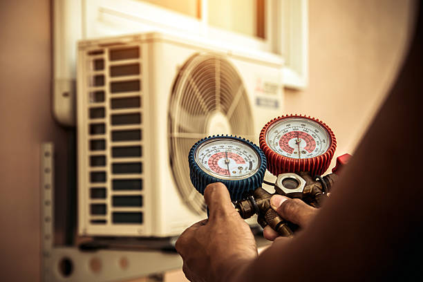 Professional Air Conditioning Service technician working in Java Center, NY